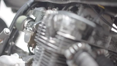 Slow Focus Pull on a Motorcycle Engine Stock Footage 203782916