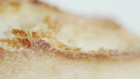 Slow focus pulling over bread surface 4K video Stock Footage 170236496