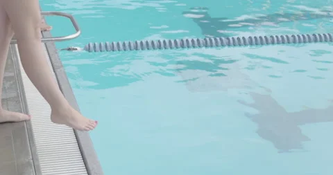 Slow Foot at edge of pool Stock Footage 136264639