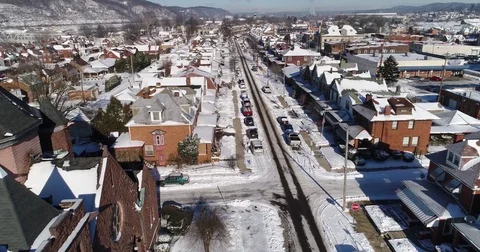 Slow Forward Aerial View Small Rust Belt Town in Winter   Stock Footage 84623333