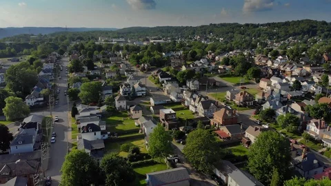 Slow Forward Aerial View of Small Town Residential Neighborhood  	 Stock Footage 90270961