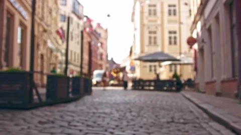 Slow forward camera movement reveals charming street cafe and market stalls. Stock Footage 311642169