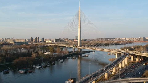 Slow forward dolly shot, above Ada bay, showing cityscape of Belgrade from ab Stock Footage 105790400