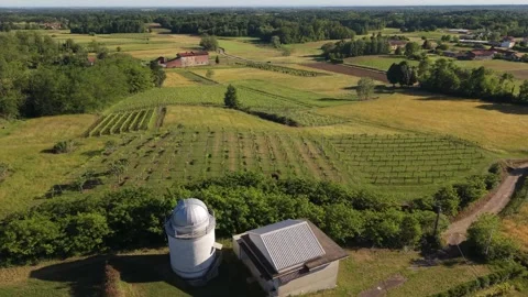 Slow Forward Drone Flight Above Observatory and Vineyards at Sunset Video stock 334940433