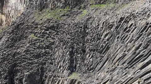 Slow Forward Drone Flight Toward Rugged Rocky Cliffs in Natural Daylight 4K Stock-Footage 337772435