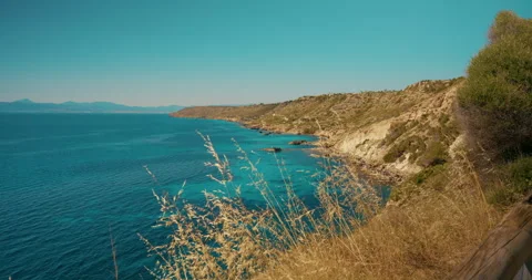 Slow Forward Movement Along Wooden Railing Over Mallorca Coastline and Cliffs Stock Footage 343589547