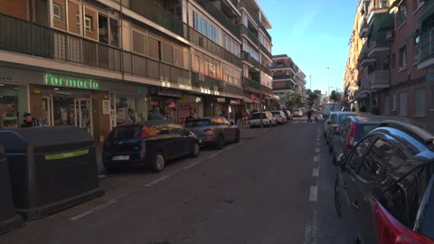 Slow forward movement on a narrow urban street in Spain Stock Footage 329510047