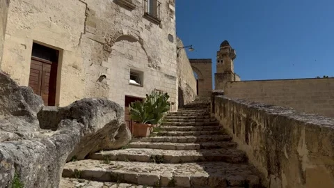 Slow Forward Movement Through Stone Steps in Sassi di Matera Stock Footage 336675434