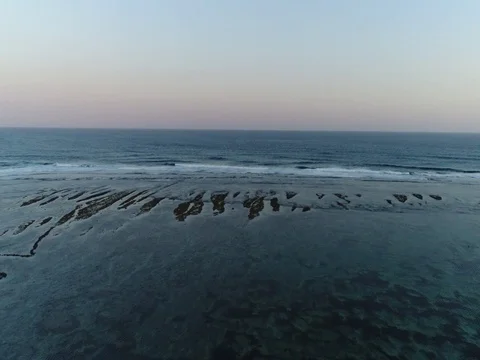 Slow forward out into the ocean from the beach in Bali, Indonesia. Stock Footage 80181206