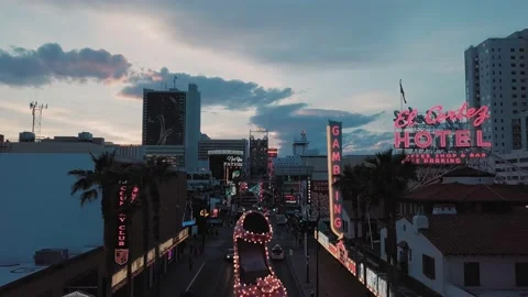 Slow forward Sunset aerial old Las Vegas Freemont St. blinking neon signs Vidéo 145174324