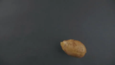 Slow frame with flying potatoes Stock Footage 97590693