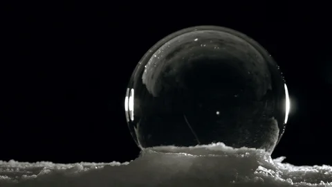 Slow freeze ice globe in cold winter Stock Footage 103219310