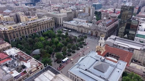Slow gliding flight over the grey roof of the Museo Historico Nacional toward Stock Footage 348237446