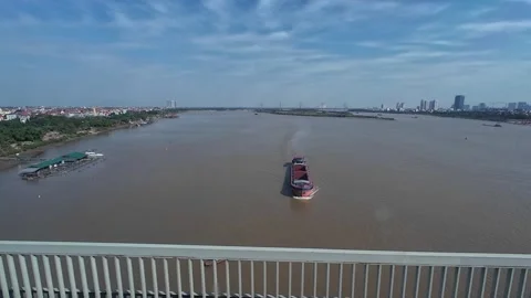 Slow high angle moving shot of river and big ship Stock Footage 295032386