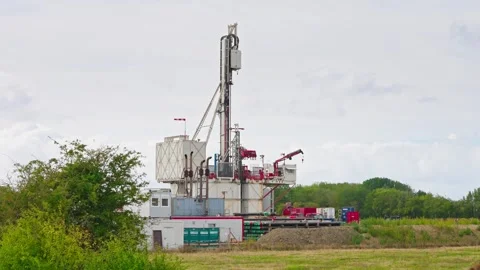 Slow horizontal pan across a deep drilling rig near Rødbyhavn, Denmark, during Stock Footage 346801881