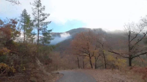 Slow Hyperlapse top of a car driving in a colorful mountain countryside 4k Stock Footage 123407463