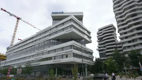 Slow left pan, building 147 of Capgemini with logo on the roof, general Stock Footage 206056953
