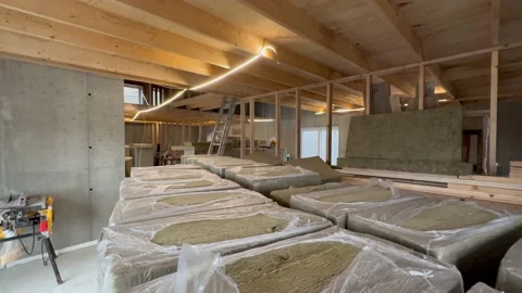 Slow left pan inside house under construction Stock-Footage 234343939
