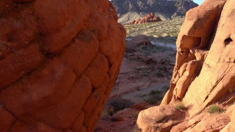 Slow left pan of red rocks at sunset. Stock Footage 155285836
