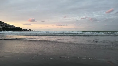 Slow Left to Right Movement Along Sunset Coastline Stock Footage 346535142