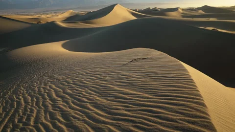 Slow left to right pan over a sea of dunes. Stock Footage 154920159
