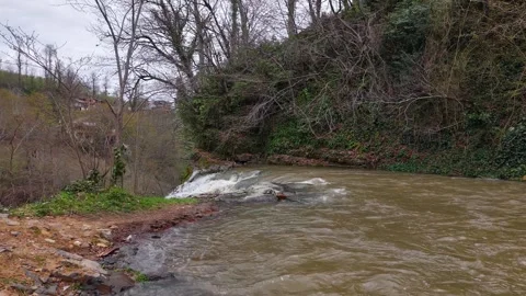 Slow Low-Level Approach to the Base of Ohtamis Waterfall Stock Footage 348025747