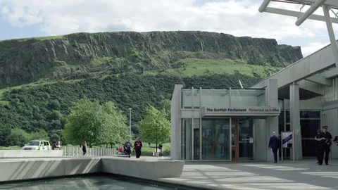 Slow medium pan, Main visitor entrance to the Scottish Parliament, Edinburgh Stock Footage 79585139