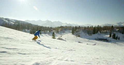 Slow Mo Of Active Person Skiing On Sunny Day Stock Footage 140116056