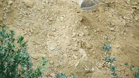 Slow Mo. Backhoe executing a soil dumping operation. While excavation Stock Footage 285858280