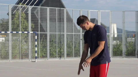 Slow-Mo: Basketball Player Practices Free Throw Stock Footage 39465193