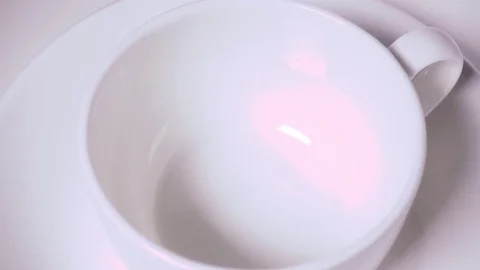 Slow mo black coffee in a white cup Video stock 71853724