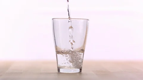 Slow Mo Clear Liquid Being Poured In Glass Stock Footage 108150345
