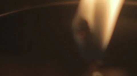 Slow Mo close up of a candle 動画素材 12139992