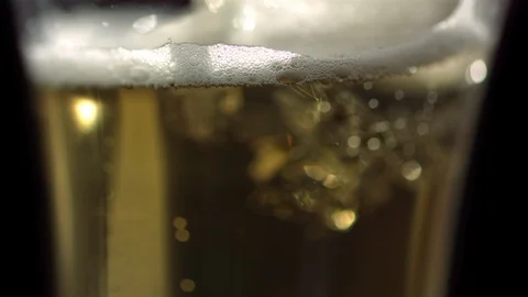 Slow Mo Close Up Foaming Beer Stock Footage 113201563