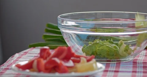 Slow-Mo Close Up Freshly Chopped Lettuce Falling Into Salad Bowl Stock Footage 126089491