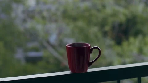 SLOW MO Coffee On Balcony Steam Video stock 138712965