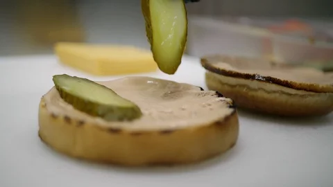 Slow-mo cooking a hamburger burger, in the kitchen a cook is on fire Stock Footage 128116677