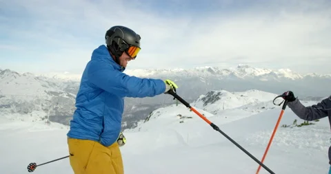 Slow Mo Of Couple Getting Ready To Start Skiing Stock Footage 140191988