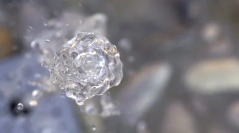Slow-Mo: Crystal Clear Jet Of Water Flowing Up In The Air Stock Footage 40010621