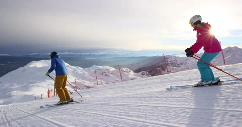 Slow Mo Of Cute Couple Skiing Together Stock Footage 140323731