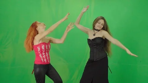 Slow-mo dance at the party of young women in gothic dresses green-screen Stock Footage 94880129