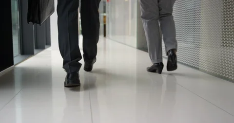 Slow Mo Dolly Walking Down Office Hallway 库存影片 97126273