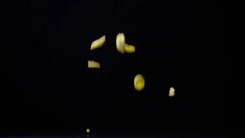 Slow mo dry beakfast cereals corn flakes are falling on the table Stock Footage