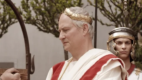 Slow Mo Emperor Accepts Drink From Somebody Stock Footage 120512413