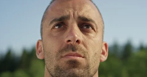Slow Mo Extreme Close Up Man Looking Determined Stock Footage 112252944