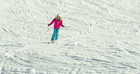 Slow Mo Of Female Going Down Snowy Hill Stock Footage 139762296