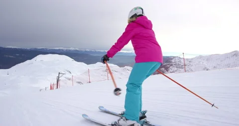 Slow Mo Of Female Skiing During Winter Stock Footage 140324672