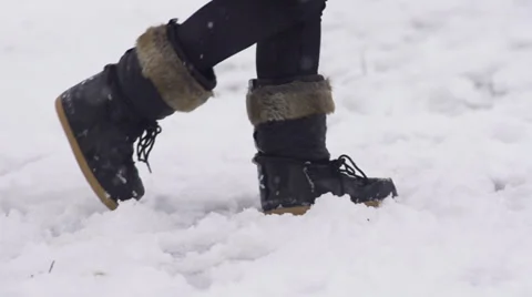 Slow-Mo: Female Snow Boots Walking Through Fresh Snow Stock Footage 33846774
