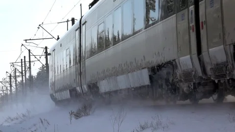 Slow-mo footage. A passing train in the winter. Snowy turbulence 库存影片 85367766