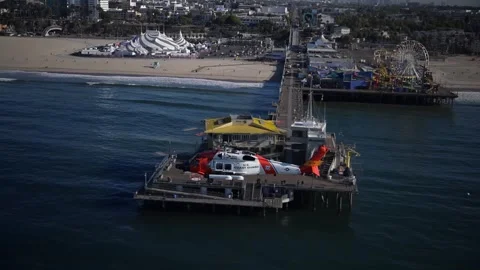 Slow-mo footage U.S. Coast Guard MH-60 Jayhawk flying near Long Beach Pier, L.A. Stock Footage 295774911